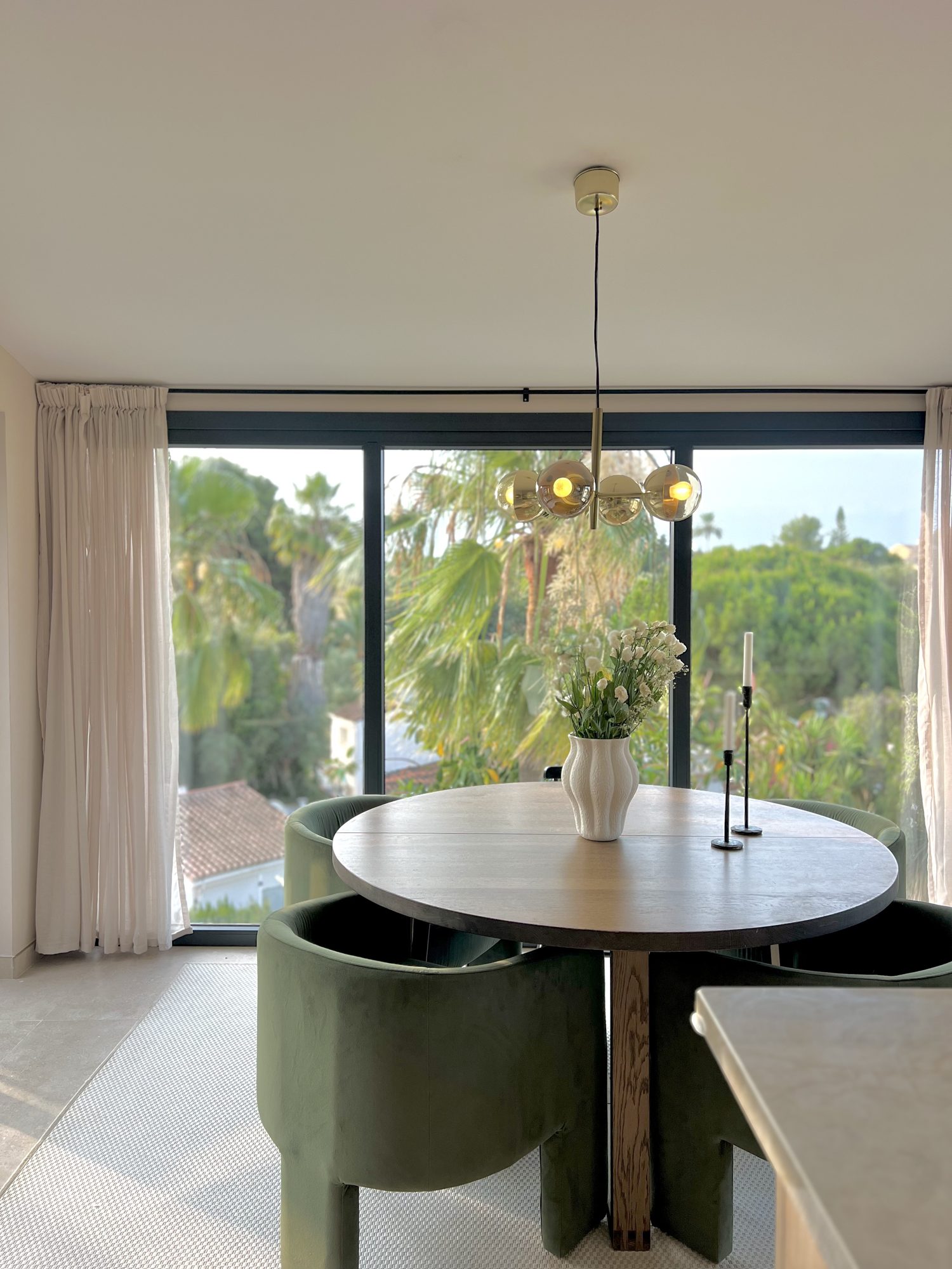 Ricmar — The dining room reads as one room with the salon.