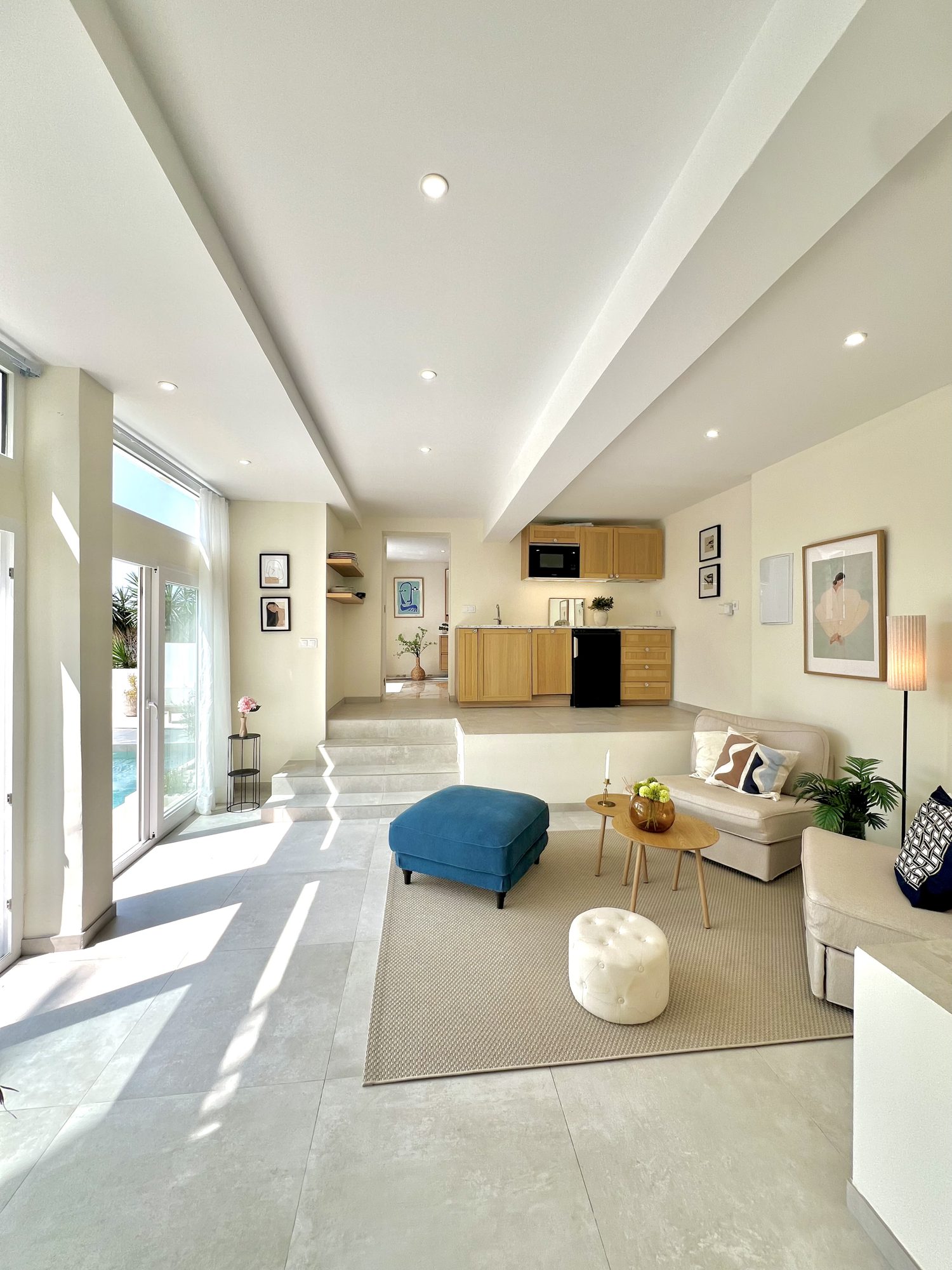 Ricmar — The pool house kitchenette and lounge.